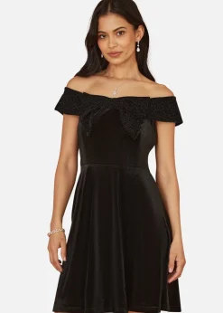Mela Black Velvet Skater Dress With Sparkle Bow Neckline