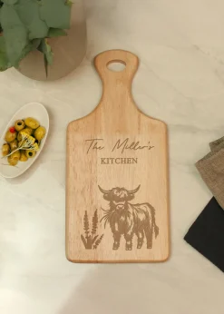 Personalised Memento Company Highland Cow Brown Paddle Chopping Board
