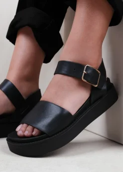 Where's That From Black Pu Phoenix Classic Flat Sandals